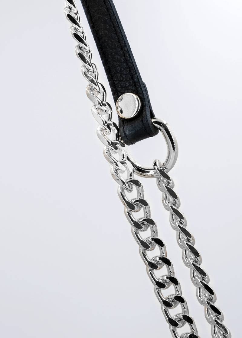 Paola T. Baguette medium in pelle morbida con dettagli argento Nuova