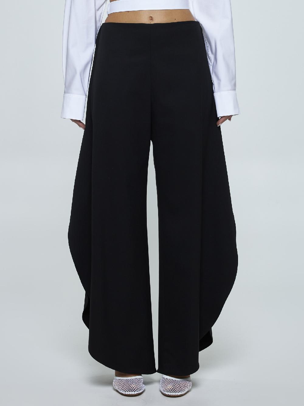 ALAÏA Pantaloni Round in lana stretch Nuova