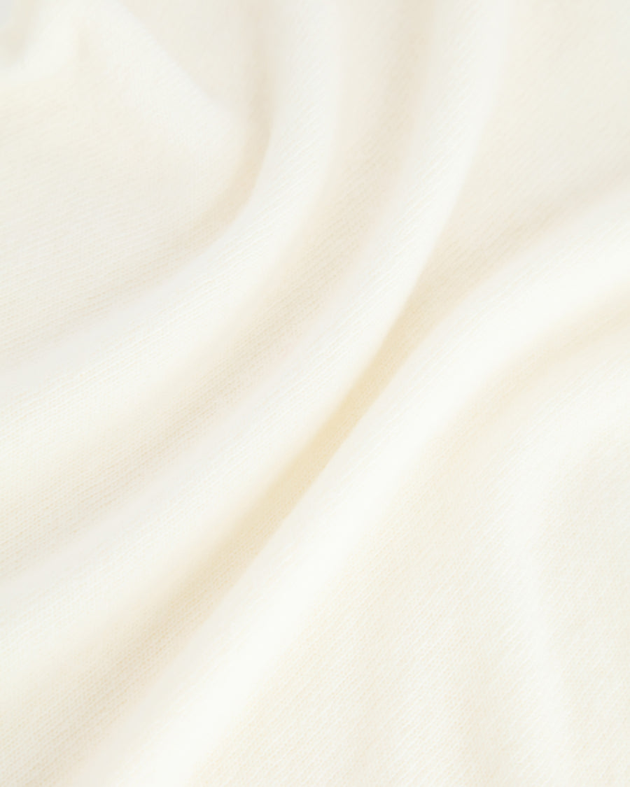 Scaglione TURTLE NECK SLIM RAGLAN SEAMLESS MILK Offerta Pasqua
