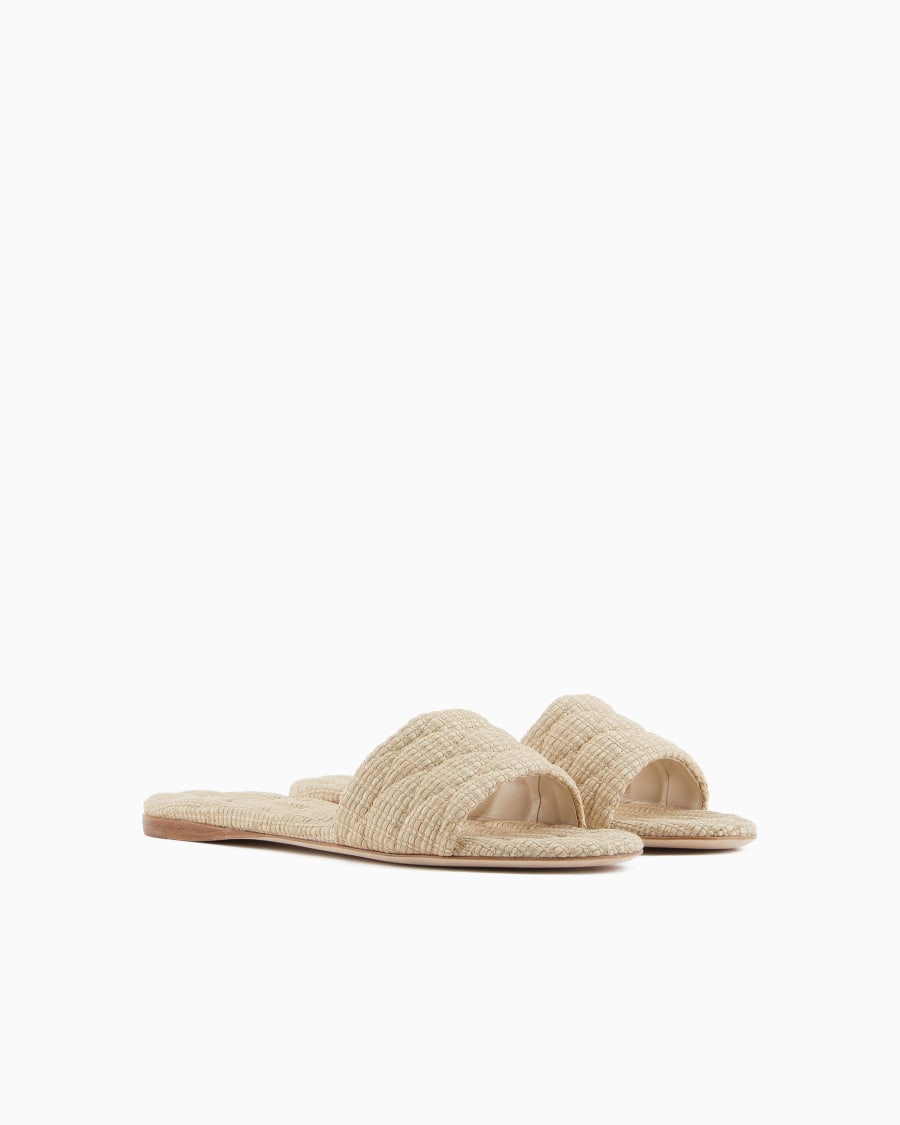 The world of armani SANDALI FLAT IN RAFIA TRAPUNTATA Sconti questo mese